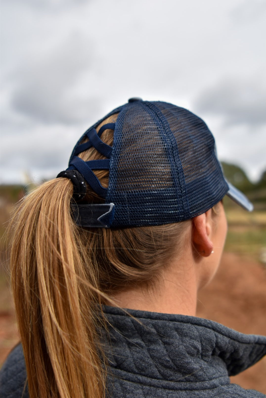 Distressed Fit & Fierce Trucker Hat with Ponytail back